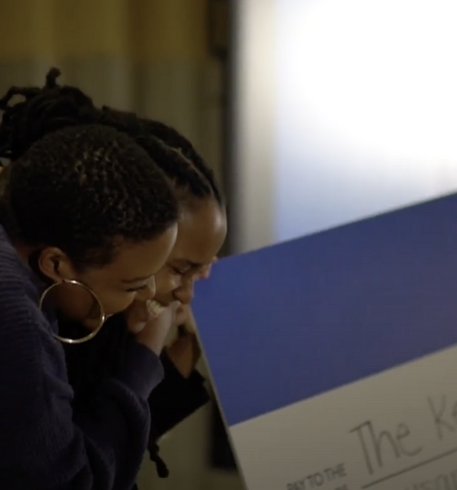 two black women hugging