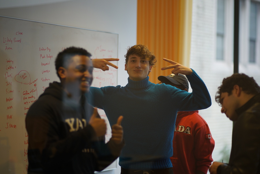 student making peace sign