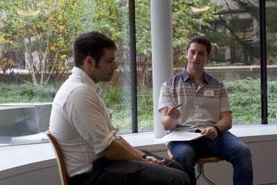 student interviewing a speaker