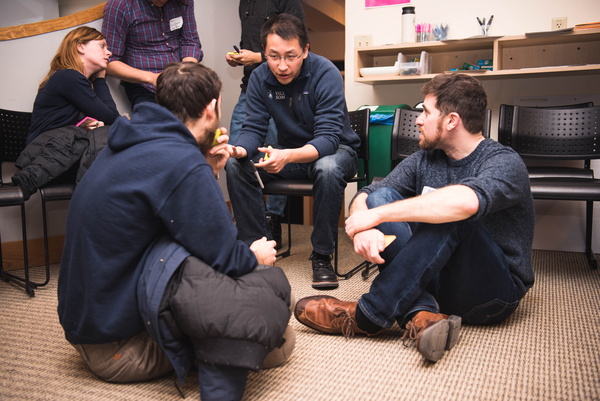Group of students speak in small group