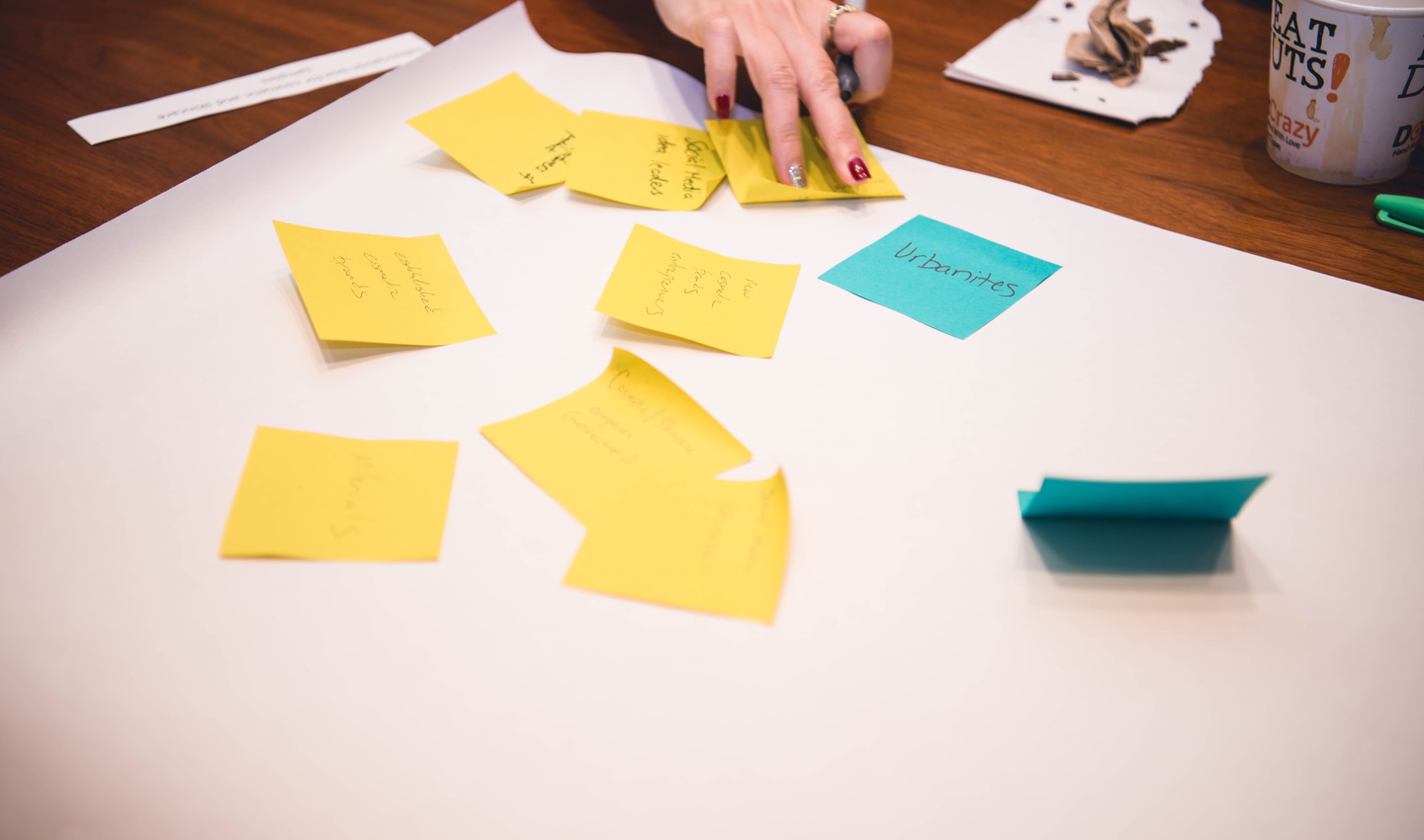 Hand with post-it notes