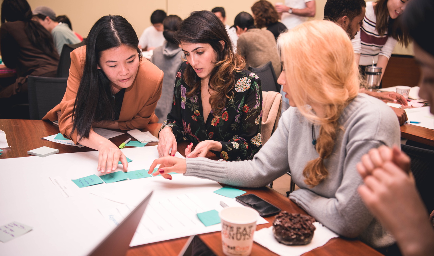 Three students in brainstorming session