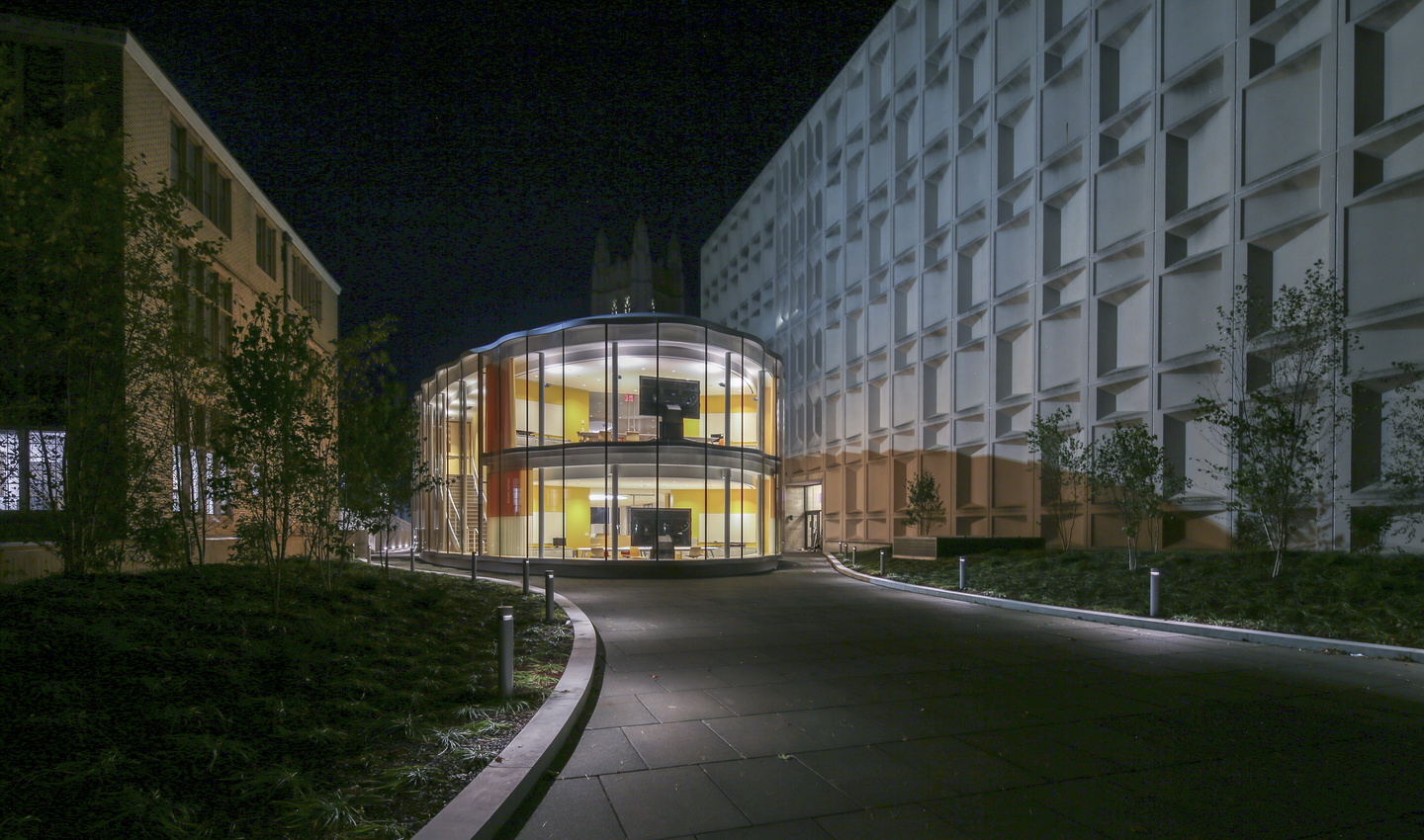 Nighttime view of exterior of Tsai CITY building