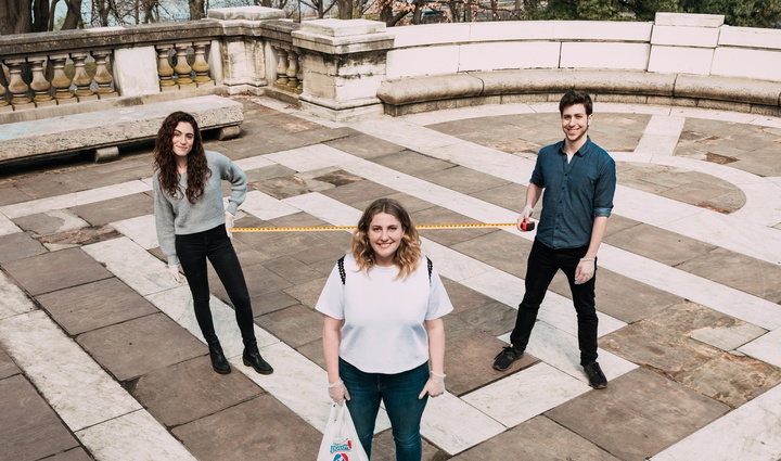 Invisible Hands founders stand six feet apart