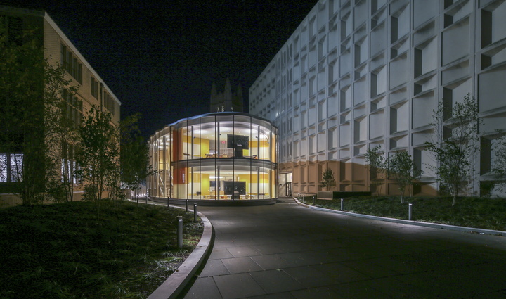Nighttime view of exterior of Tsai CITY building