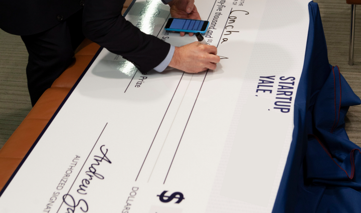 large check for startup yale