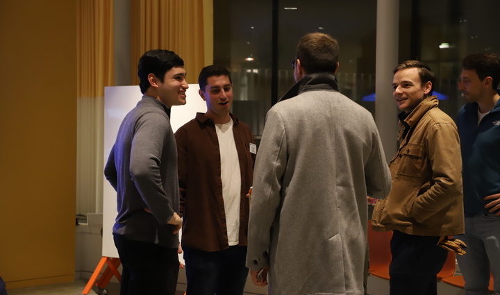 students in a circle chatting 