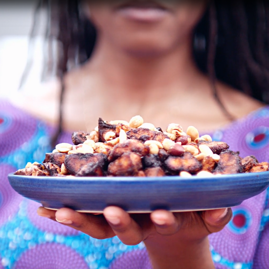 Image of person holding plate of plantains