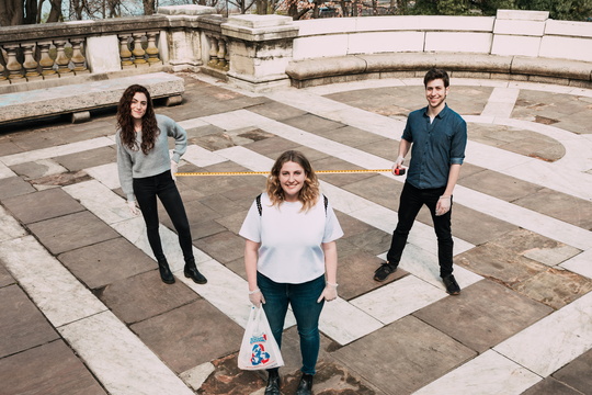 Invisible Hands founders stand six feet apart