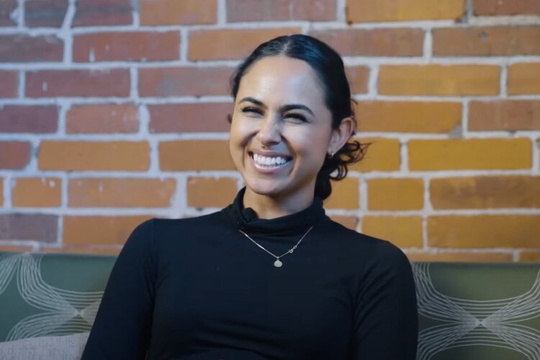 Michelle Badr laughs in video screenshot