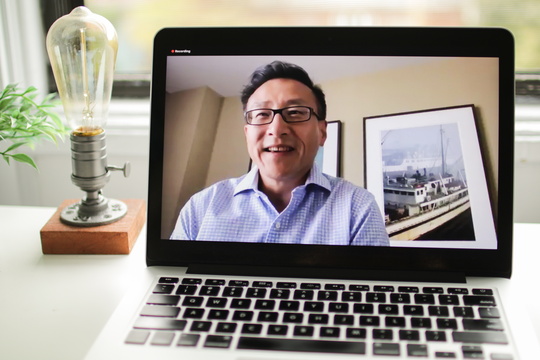 Image of laptop playing Joe Tsai virtual talk