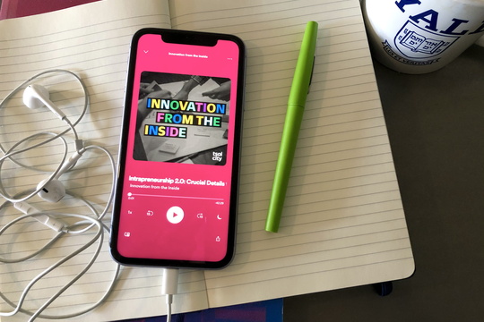 View of phone playing Innovation from the Inside podcast