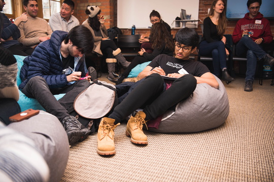 Students sit on beanbags and brainstorm during accelerator session