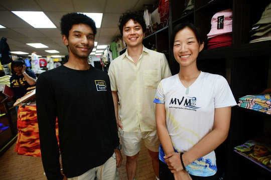 a group of people standing in a store